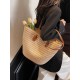 The 2025 summer new straw-woven women's bag is fashionable, versatile, and has a large capacity. It is a single-shoulder bag for classes and commuting