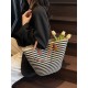 The 2025 summer new straw-woven women's bag is fashionable, versatile, and has a large capacity. It is a single-shoulder bag for classes and commuting