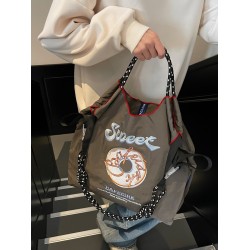 The Ball Chain doughnut embroidered shopping bag with the same style as the Internet celebrity is a fashionable large-capacity hand-held bag and shoulder tote bag
