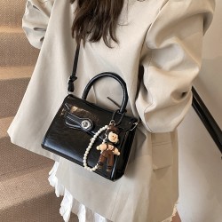 The new fashionable and color-blocking hand-held small square bag for women, the unique and high-quality single-shoulder bag with a retro lock button, and the crossbody bag