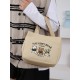 A large-capacity, cute and versatile student canvas bag, a handbag for female mothers to carry when going out, and a commuting bento bag for office workers A large-capacity, cute and versatile student canvas bag, a handbag for female mothers to carry when going out, and a commuting bento bag for office workers