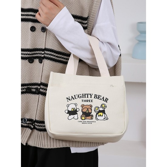 A large-capacity, cute and versatile student canvas bag, a handbag for female mothers to carry when going out, and a commuting bento bag for office workers A large-capacity, cute and versatile student canvas bag, a handbag for female mothers to carry when going out, and a commuting bento bag for office workers