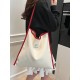 The 2025 summer new Dopamine-colored large-capacity single-shoulder tote bag is a simple and versatile student commuting bag for class