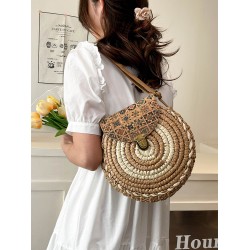 The 2025 new straw-woven bag features a niche design for women, is a fashionable and versatile small round bag that can be carried across the body for beach vacations