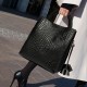 The 2025 new model of Qiandian genuine leather women's bag, a large-capacity handbag with a feminine charm, is a single-shoulder woven pattern handbag that can be carried by hand The 2025 new model of Qiandian genuine leather women's bag, a large-capacity handbag with a feminine charm, is a single-shoulder woven pattern handbag that can be carried by hand