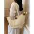 The 2025 summer new straw woven bag is fashionable and versatile, a single-shoulder bag with large capacity, a tote bag, and a women's bag for commuting to work