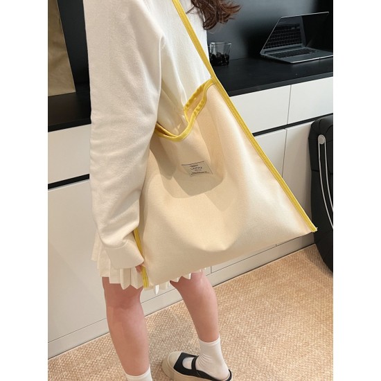 The 2025 summer new Dopamine-colored large-capacity single-shoulder tote bag is a simple and versatile student commuting bag for class