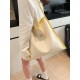 The 2025 summer new Dopamine-colored large-capacity single-shoulder tote bag is a simple and versatile student commuting bag for class