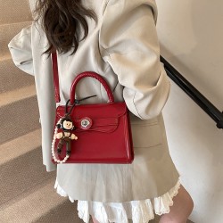 The new fashionable and color-blocking hand-held small square bag for women, the unique and high-quality single-shoulder bag with a retro lock button, and the crossbody bag
