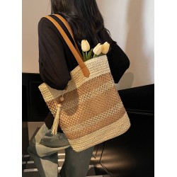The 2025 summer new tassel fashion and versatile hollowed-out woven bag, straw woven bag, beach bag, single-shoulder bag and women's bag
