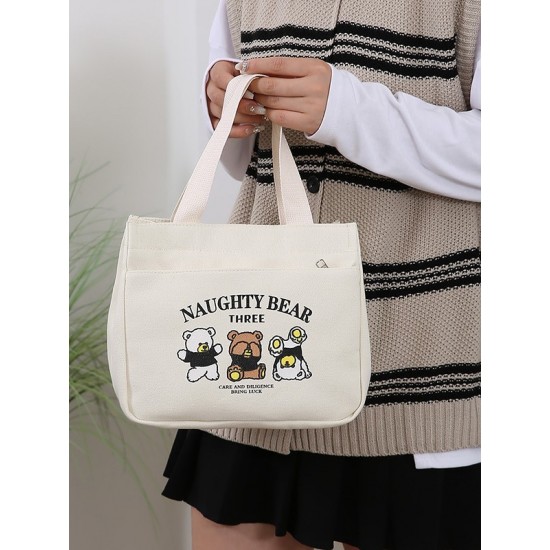 A large-capacity, cute and versatile student canvas bag, a handbag for female mothers to carry when going out, and a commuting bento bag for office workers A large-capacity, cute and versatile student canvas bag, a handbag for female mothers to carry when going out, and a commuting bento bag for office workers