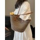 The 2025 summer new straw-woven women's bag is fashionable, versatile, and has a large capacity. It is a single-shoulder bag for classes and commuting