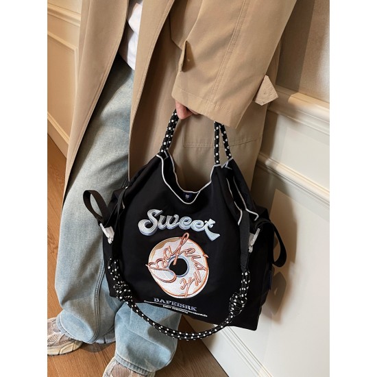 The Ball Chain doughnut embroidered shopping bag with the same style as the Internet celebrity is a fashionable large-capacity hand-held bag and shoulder tote bag