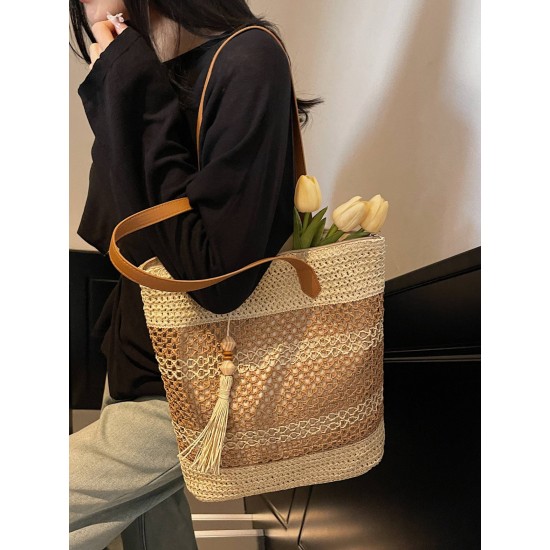 The 2025 summer new tassel fashion and versatile hollowed-out woven bag, straw woven bag, beach bag, single-shoulder bag and women's bag