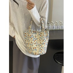 A small floral canvas bag, a large white bucket for women on Instagram, a baby bag, and a handbag for mom to go out to work and commute